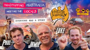Paul Moore, Jamie, and Luke on the official Random Aussies poster — an Australian travel series created by Moore Acting Instinct and streamed on Amazon Prime worldwide.