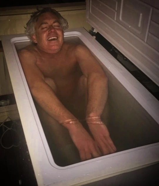 Paul Moore in a cold plunge ice bath as part of his mental health and discipline training routine in Geelong.