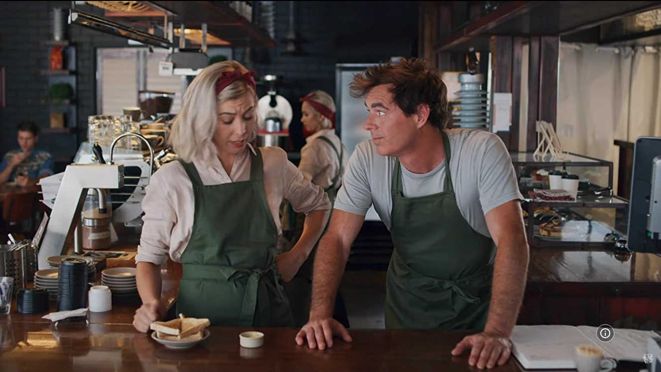Paul Moore as Shaun working in a café with his wife after losing everything — a heartfelt scene from Rostered On.