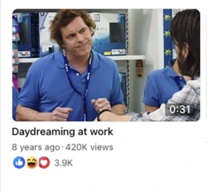 Paul Moore as Shaun daydreaming about a rude customer in Rostered On’s viral “Daydreaming at Work” scene — imagining telling him to sit in a bath with the toaster still plugged in.