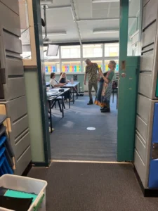 Paul Moore as Bates in Stashamo High, struggling to hold it together during an awkward sex-education class.