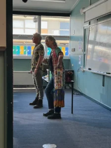 Paul Moore as Bates on the Stashamo High set in Geelong, filming a tense classroom scene from the Australian comedy feature.